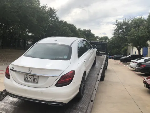 Mercedes-Benz C300 on a flatbed tow truck in Dallas, TX