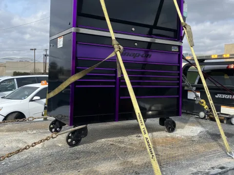 Snap-on tool chest strapped on a flatbed in Dallas, TX