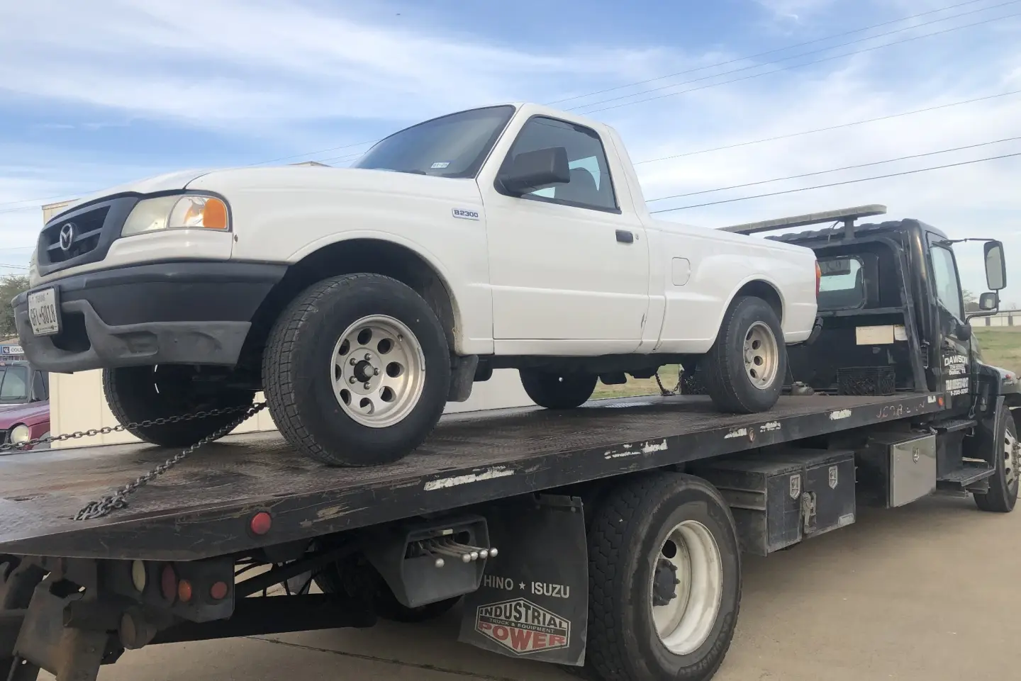 Pickup on a Dawson Tow Service flatbed in Dallas, TX